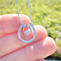 For Granddaughter from Grandmother: Linked Horseshoe Pendant